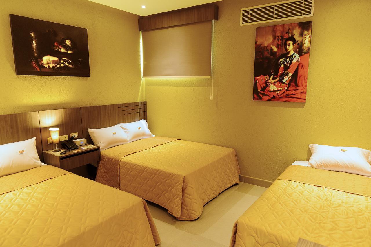 Np Hotel Y Suites Гуаякиль Экстерьер фото